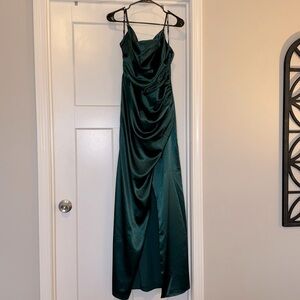 Emerald green formal dress with slit.